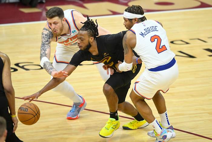 Mar 3, 2024; Cleveland, Ohio, USA; Cleveland Cavaliers guard Darius Garland (10) loses the ball while defended by New York Knicks center Isaiah Hartenstein (55) and guard Miles McBride (2) in the fourth quarter at Rocket Mortgage FieldHouse. Mandatory Credit: David Richard-USA TODAY Sports